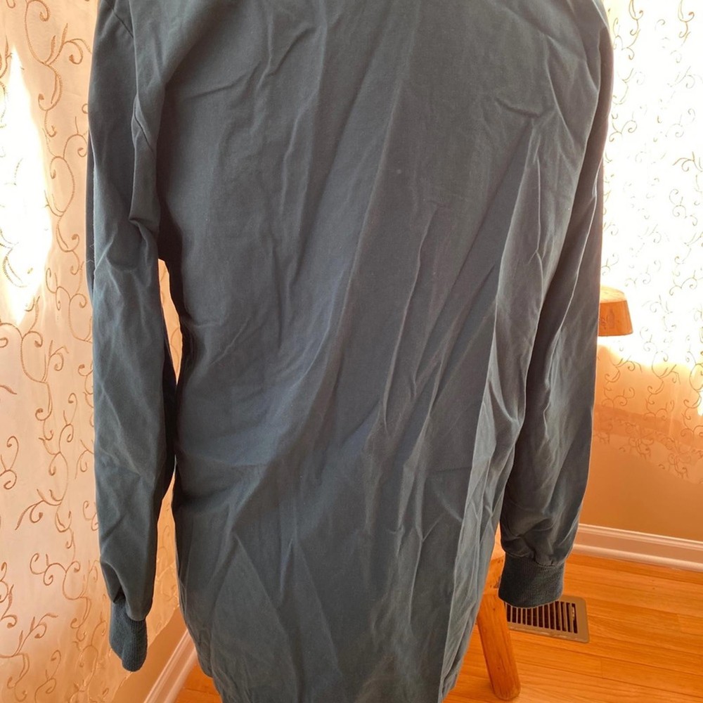 Woman's Teal color scrub Jacket Size S