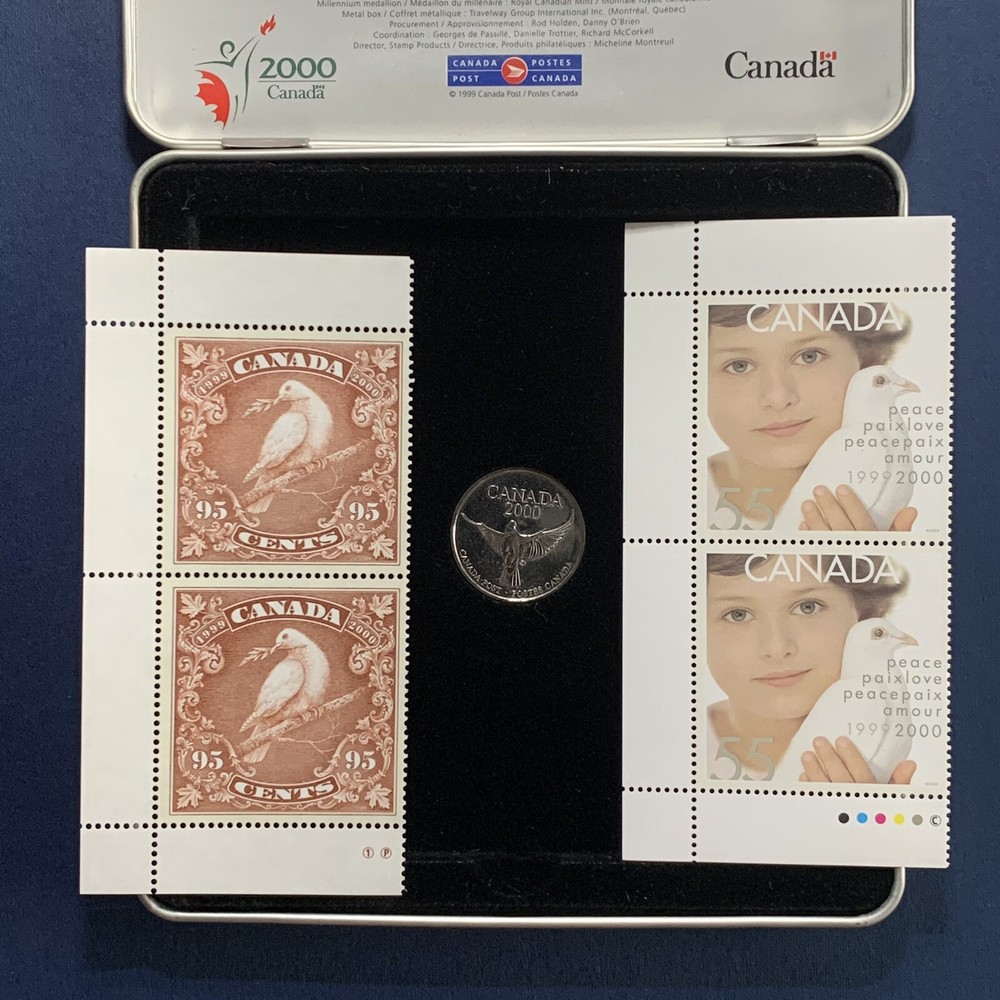 1999 2000 CANADA MILLENNIUM KEEPSAKE COIN AND MINT STAMPS SET IN TIN BOX