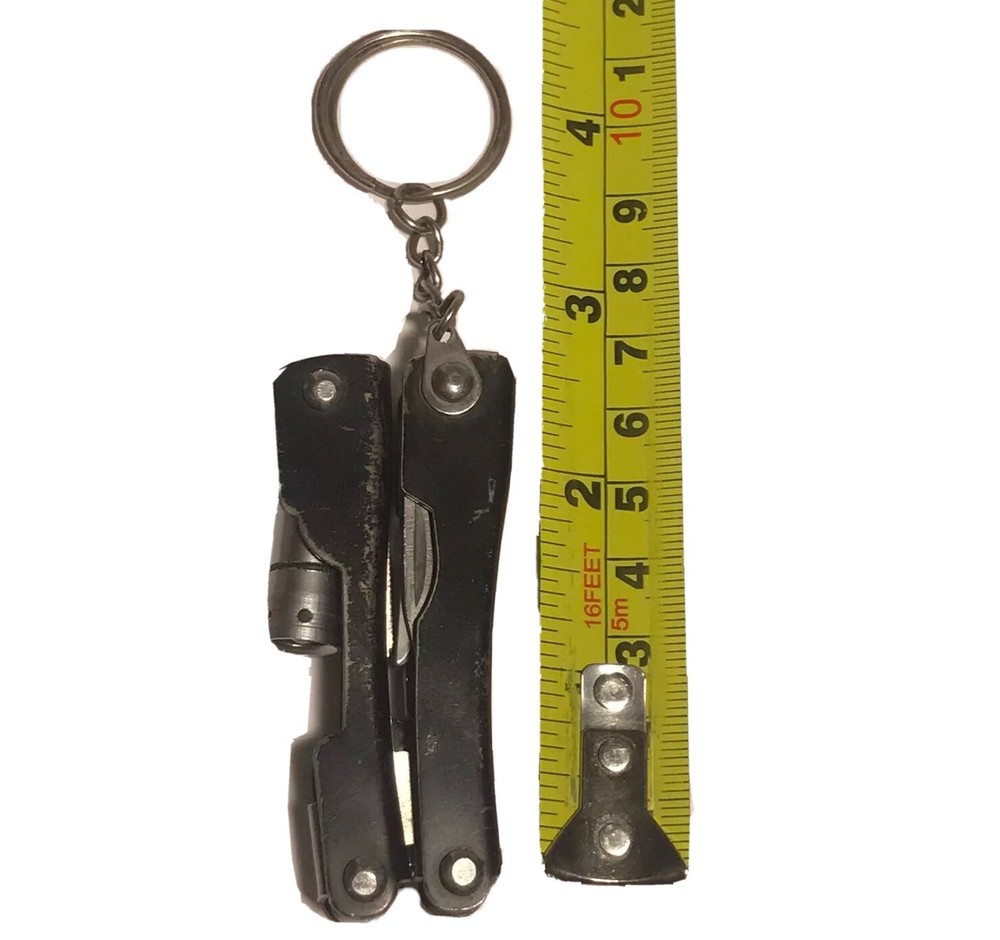Multi-function Pocket Knife Saw LED Torch Pliers Bottle Opener Camping Gear Tool