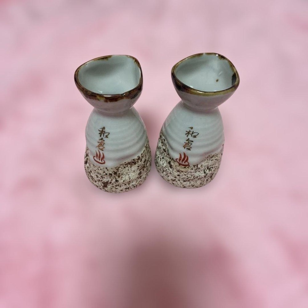 2 sake bottles with Wakura Onsen logo