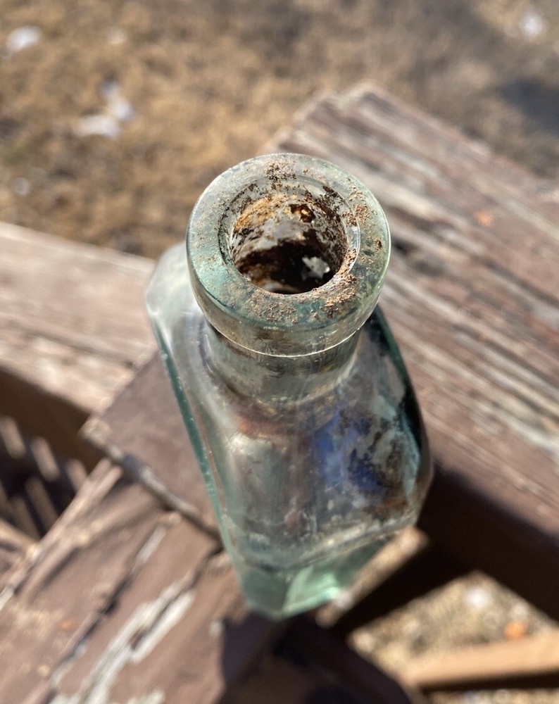 Three In One Oil Co Bottle With Contents