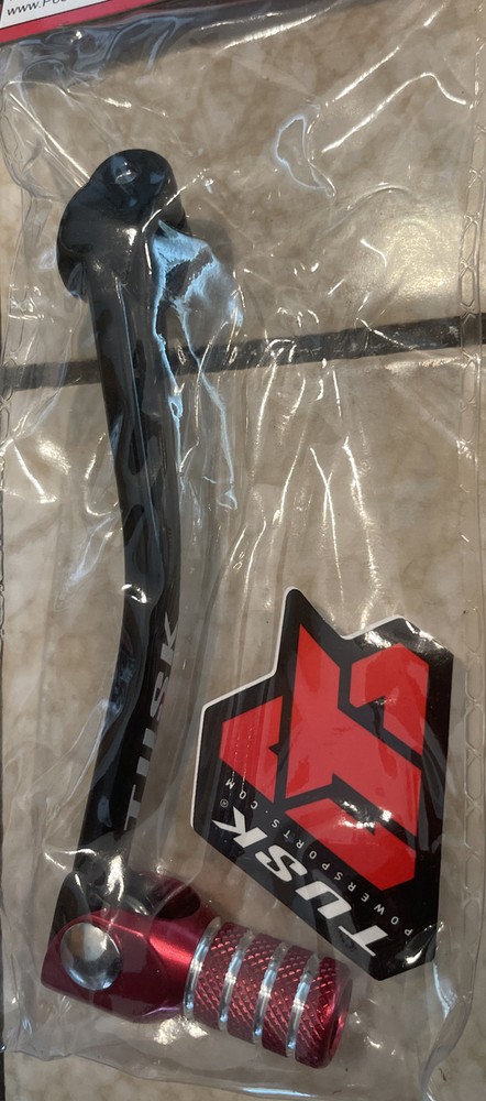 tusk folding shift lever