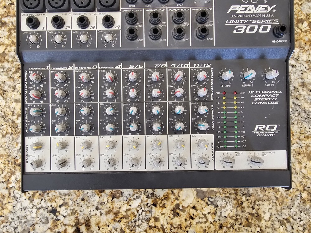 peavey 300 UNITY SERIES 12 CHANNEL COMPACT STEREO CONSOLE.