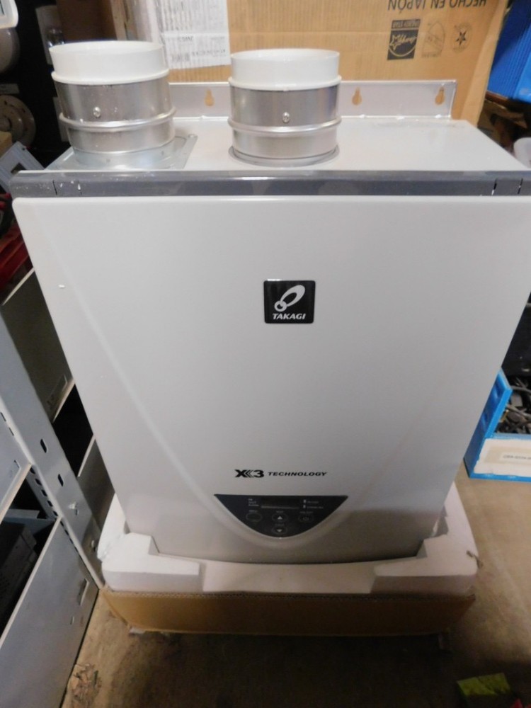 NEW TAKAGI 199k BTU Natural Gas Tankless Water Heater - TK-540X3-NIH - Dinged