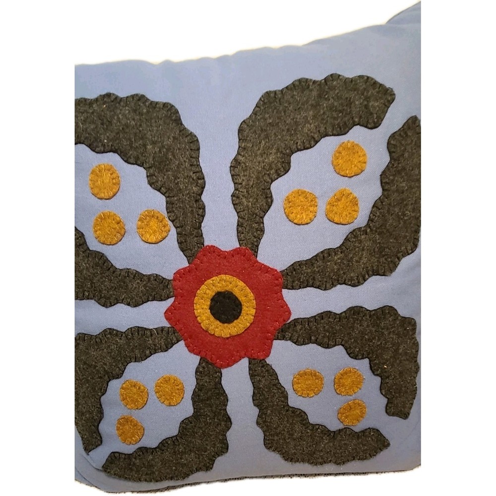 Large symmetrical floral Throw Pillow Crafted through Applique' Pattern