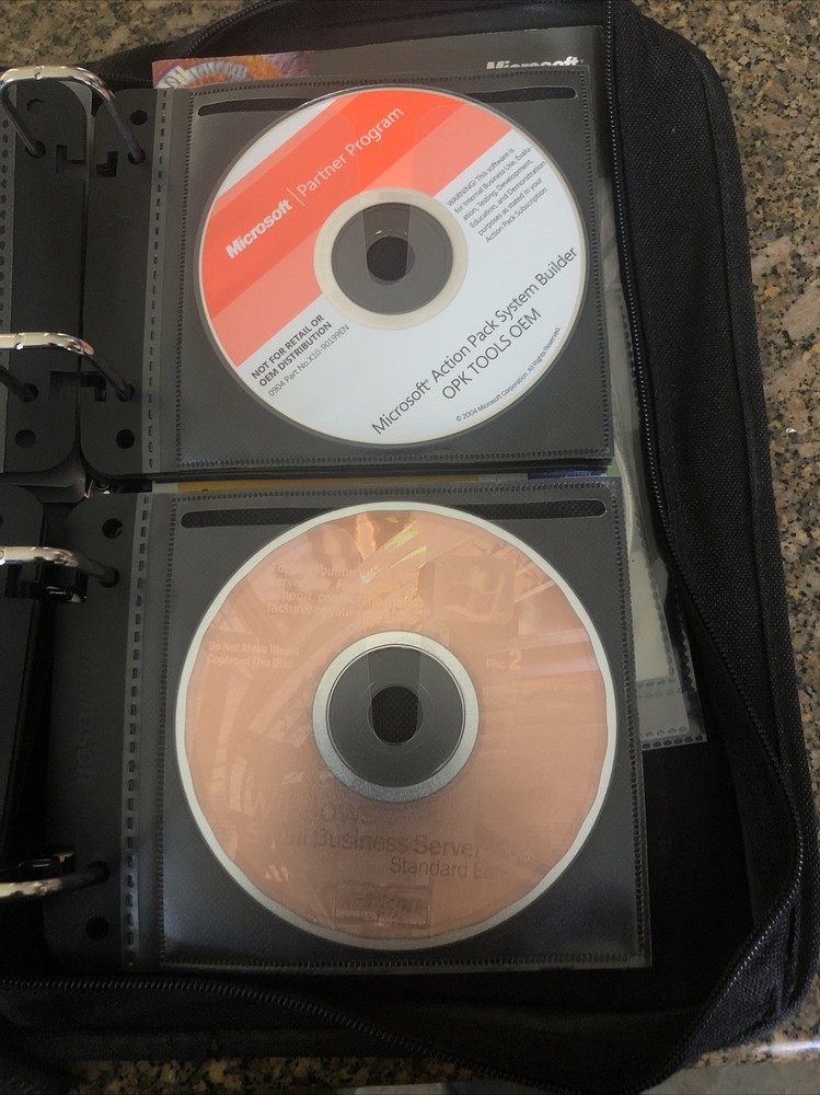 Microsoft Action Pack-Asst. Software 48 CDs- Many Keys Included