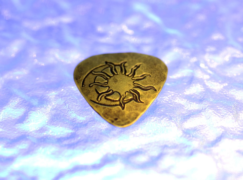 Sun and Moon playable brass guitar pick