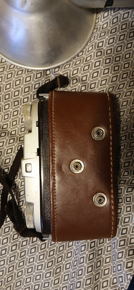 Vintage Camera,Lens, And Flash Bulb.