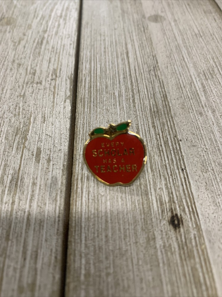 “Every Scholar Has A Teacher” Apple Pin
