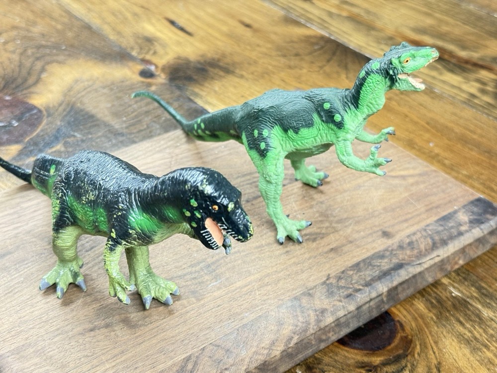 Carnegie Collection dinosaur models original and revised Allosaurus