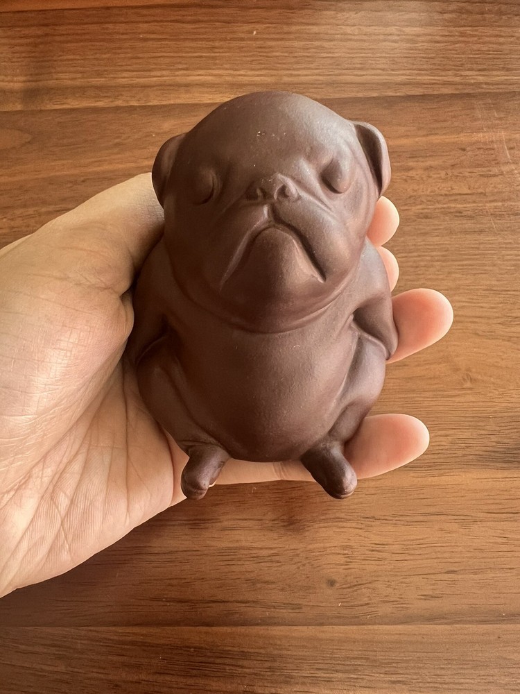 Purple clay ceramic puppy.