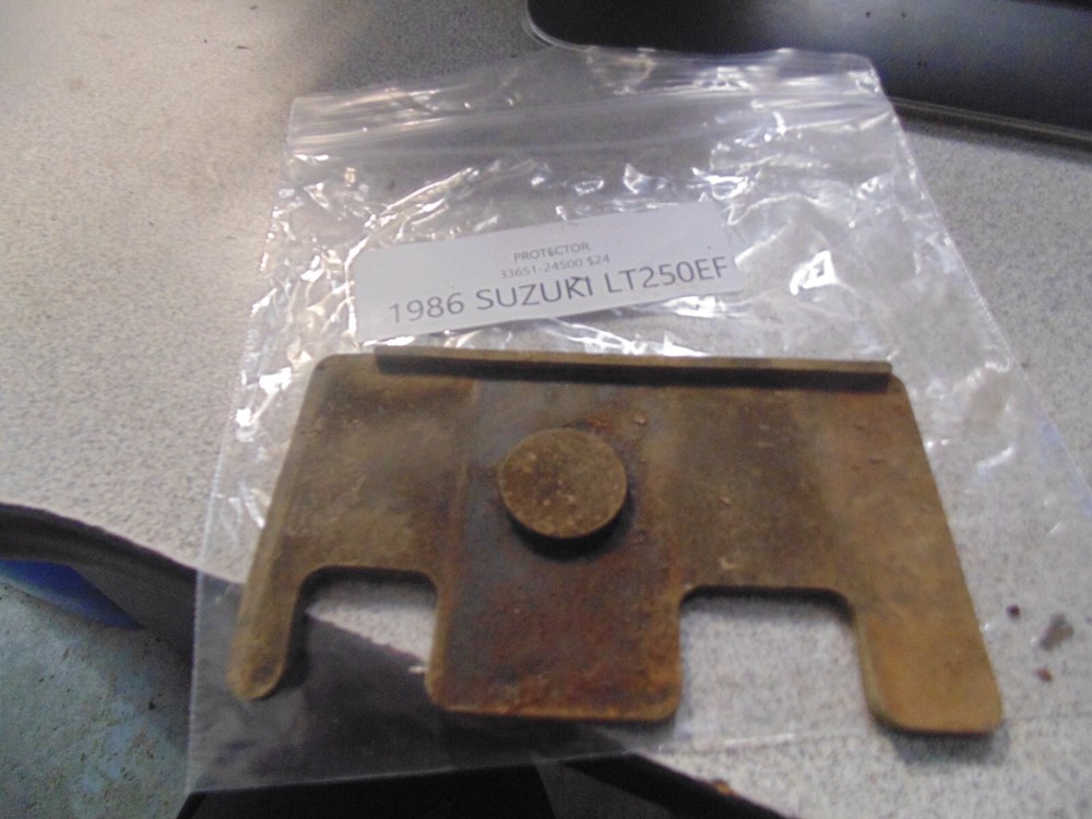 1986 SUZUKI LT250EF PROTECTOR 33651-24500