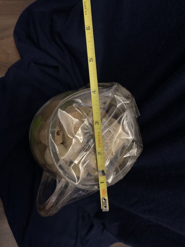 Wine Bottle Corks In Hand Painted Pitcher