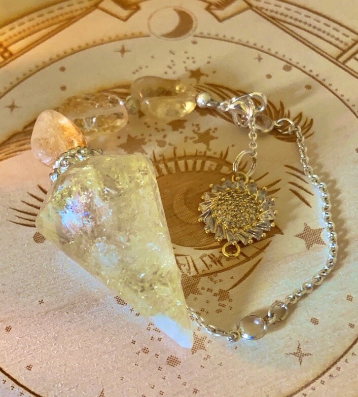 Citrine crystal pendulum and pendulum board
