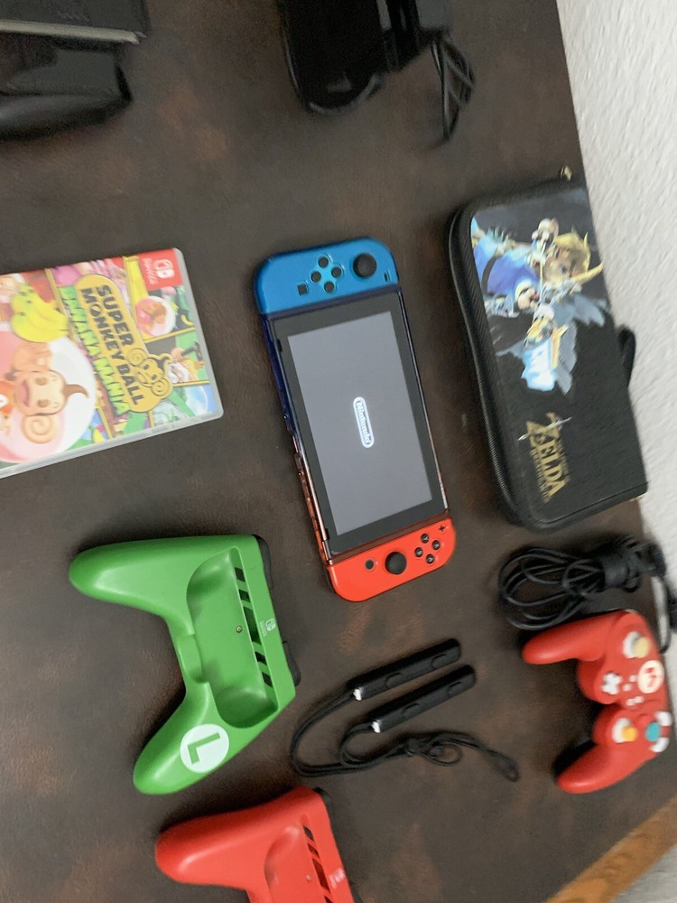 Nintendo Switch Console With A Bunch Of Stuff