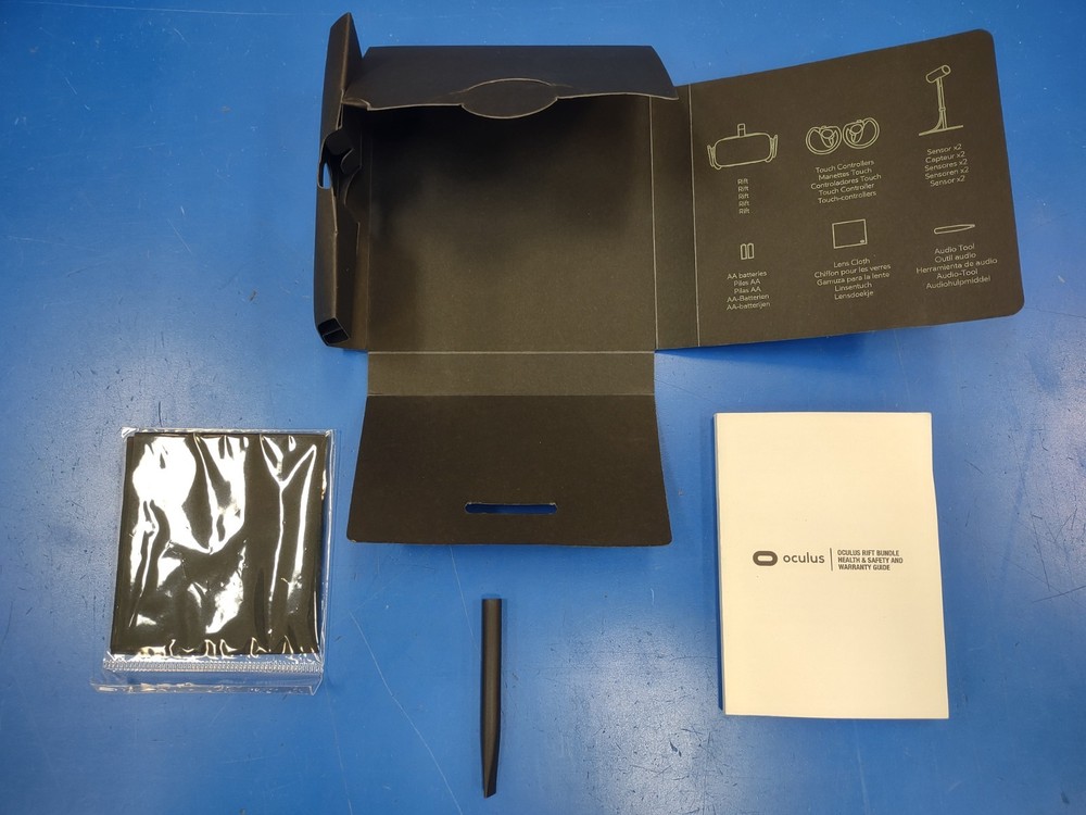 Oculus Rift VR Headset with controllers, sensors, and original box