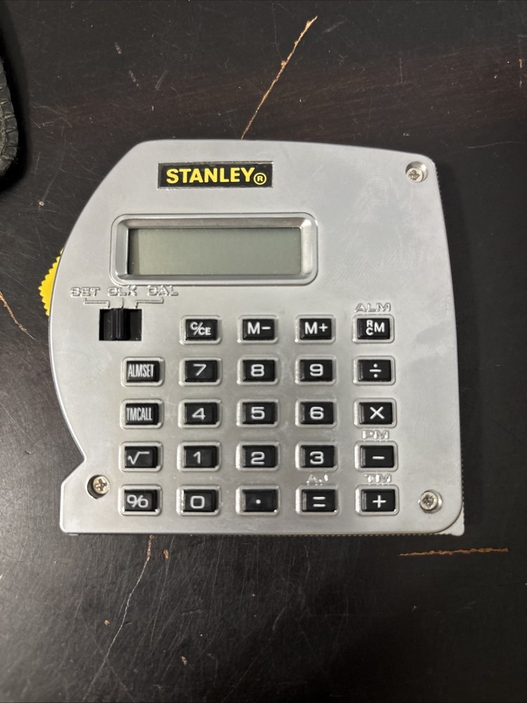 Vintage STANLEY TOOLS Powerlock Calculator/Clock Combination with Leather Case.