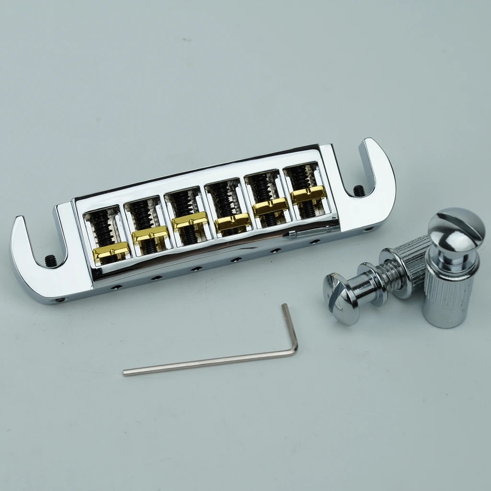 Adjustable wraparound tailpiece for LP electric guitars