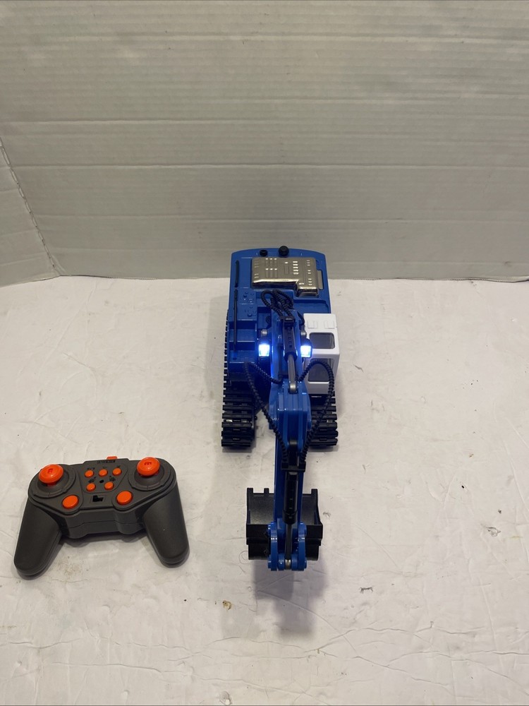Coplus Remote Control Back Loader. Works great. No charger for tractor itself ￼