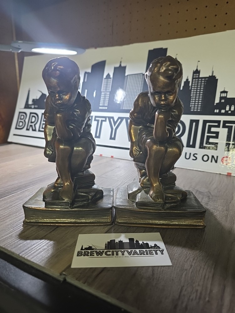 Metal bronze young boy Thinkers Bookends