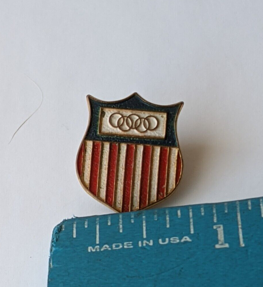 U.S.A OLYMPIC SHIELD SOUVENIR PINBACK. UNKNOWN MAKER. ENAMELED SURFACE
