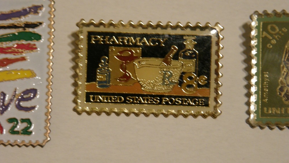 Love / Pharmacy / Amethyst Postage Stamp Pinbacks Three Total Lightly Used