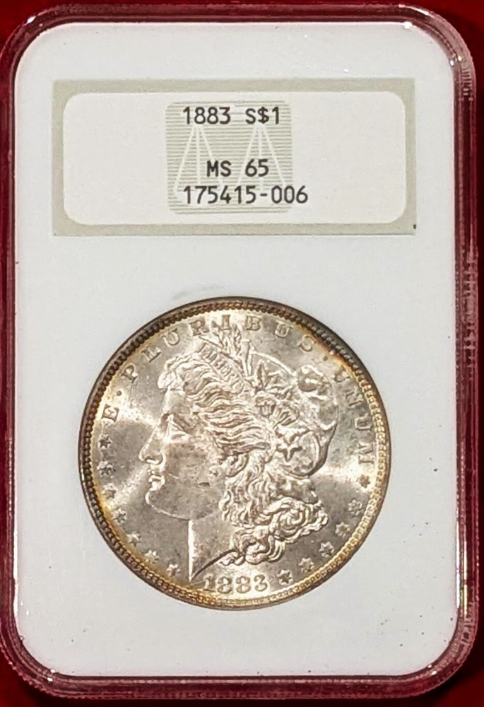 1883 MORGAN SILVER DOLLAR GRADED AN MS65 BY NGC