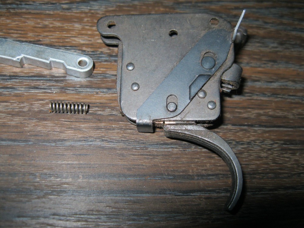Used Remington 700 Trigger assembly with sear and spring