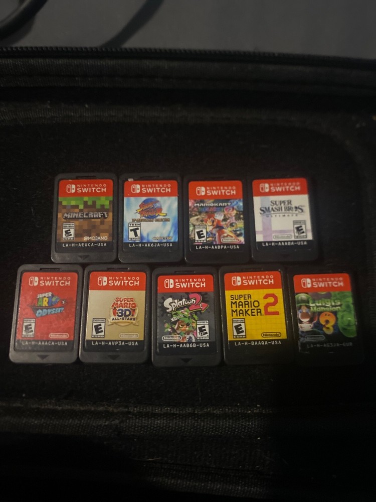 Used Black nintendo switch Super Bundle (Games)(Pro Controller)(carrying case)