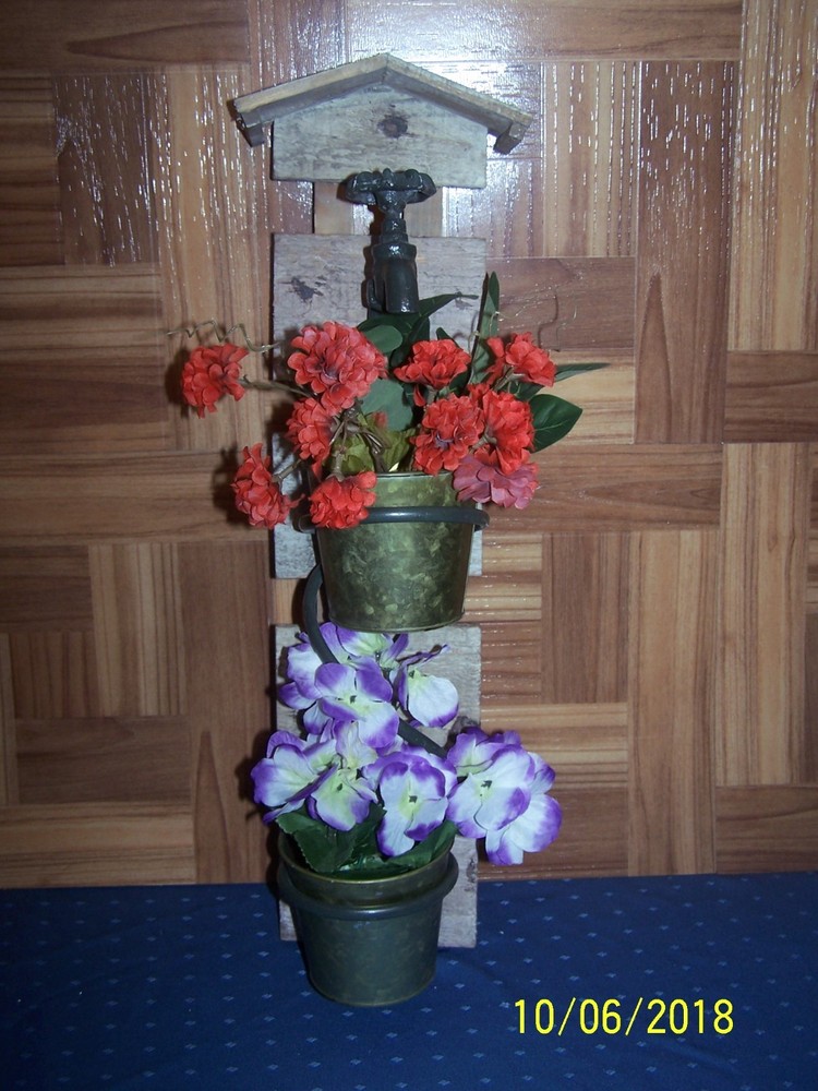 Rustic Looking Double Wall Planter featuring 2 planters and decorative faucet