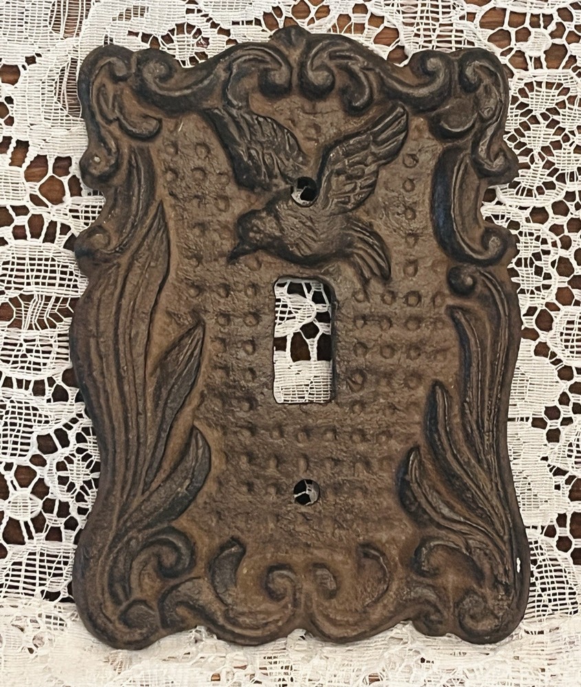 Cast iron Rocker Switch Plate Bird/Scroll