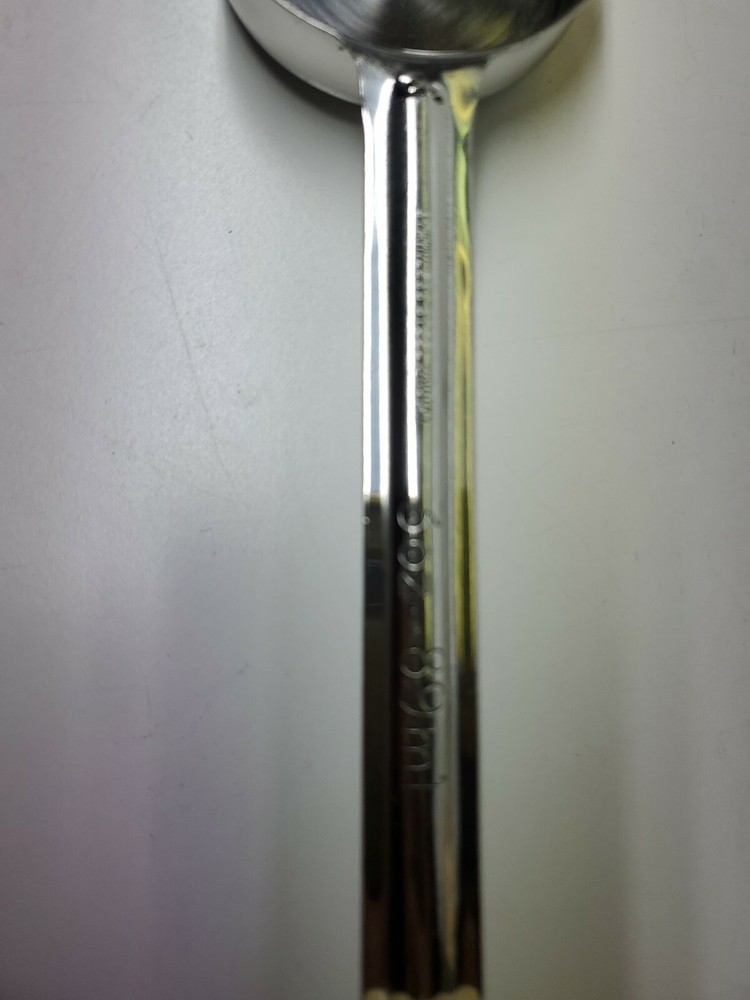 Winco - FPS-3 - 3 oz Beige Solid Portion Spoon