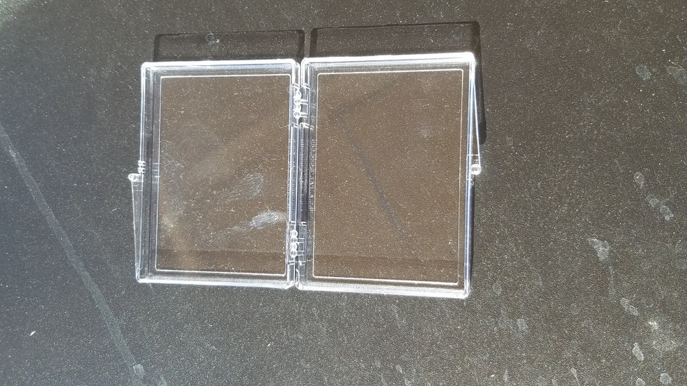 TWO (2) BCW 25 count plastic trading card holders