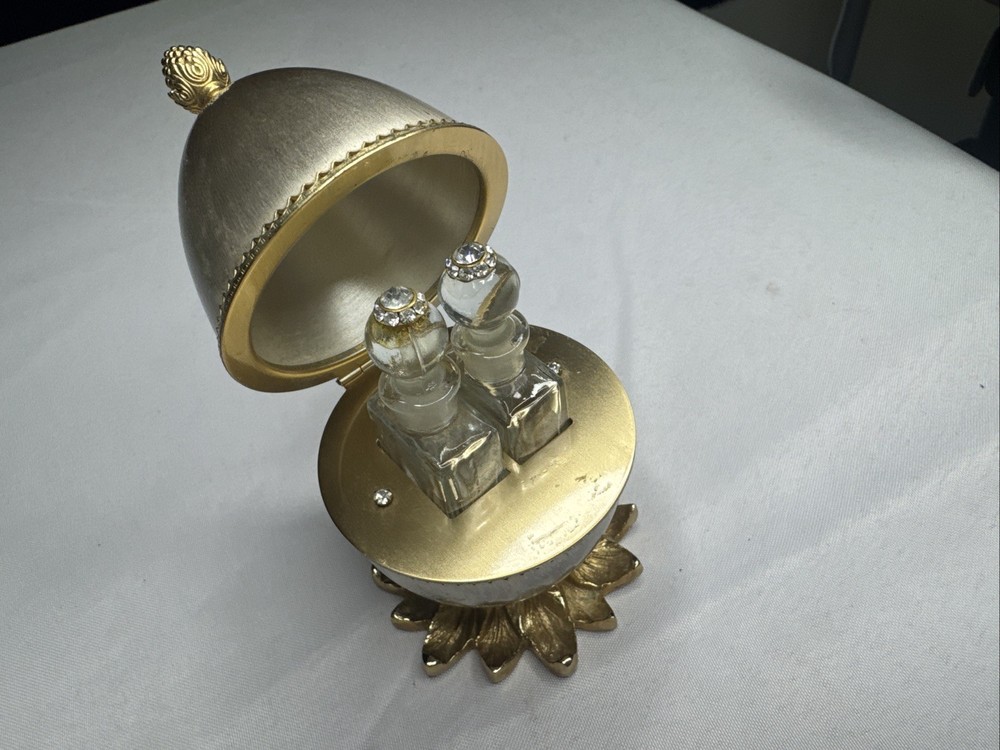 Evans MCM Perfume Egg With Rhinestones