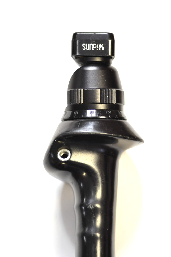 Sunpak deluxe flash / accessory / grip bracket with their cable release.