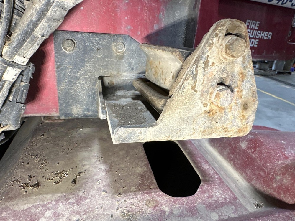 International 9400 Left/Driver Hood Rest - Used