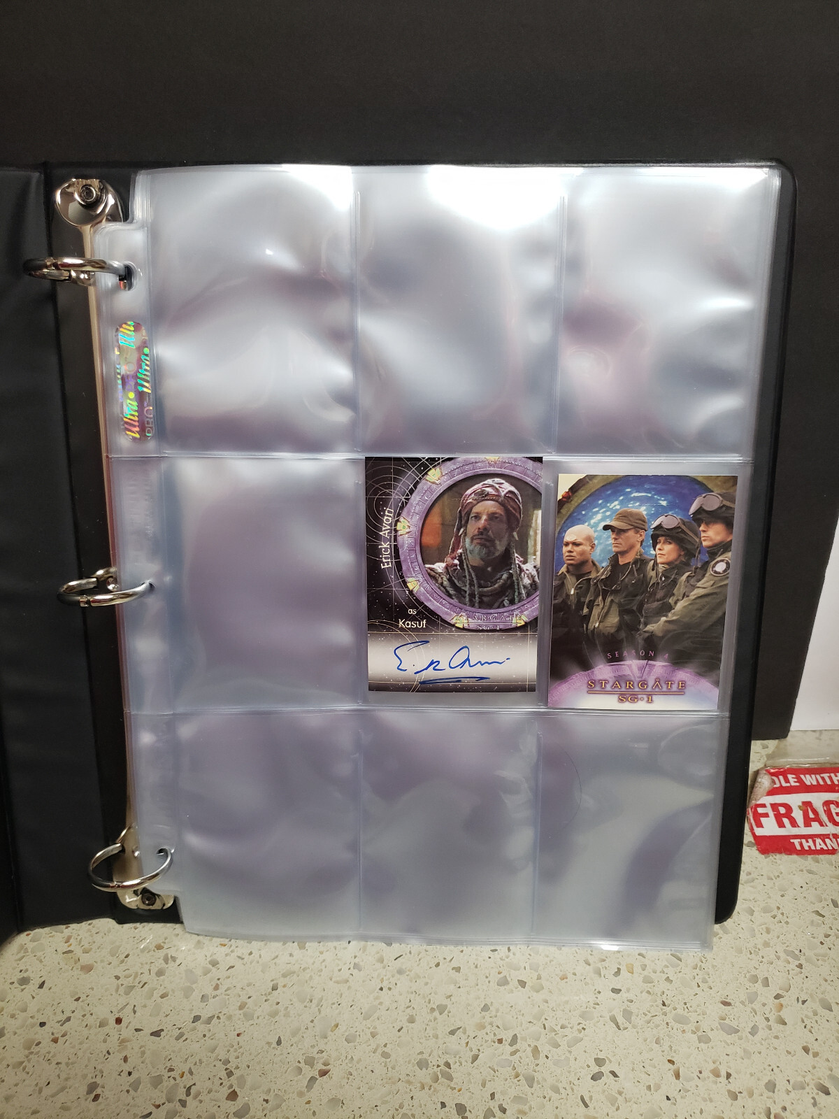 Stargate SG1: Season 4 Binder with Erick Avari Kasuf autographed card & Promo