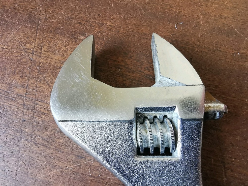 Modern 10" Adjustable Spanner to clear, no makers name.