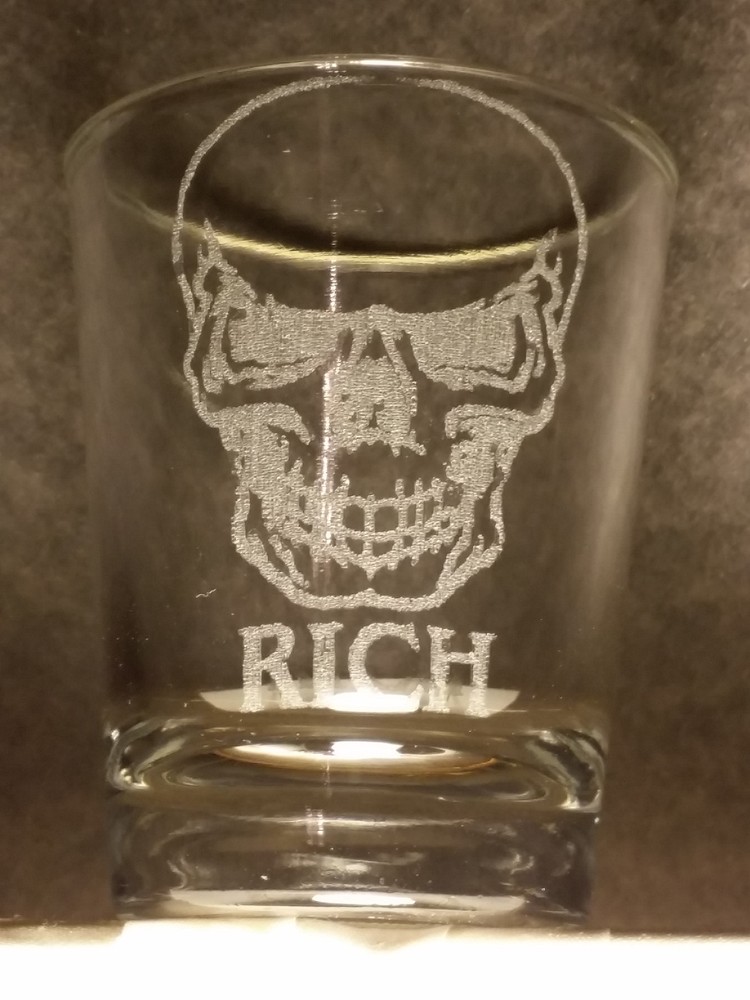 2 Skull etched shot glass. Can be personalized. Different designs available!