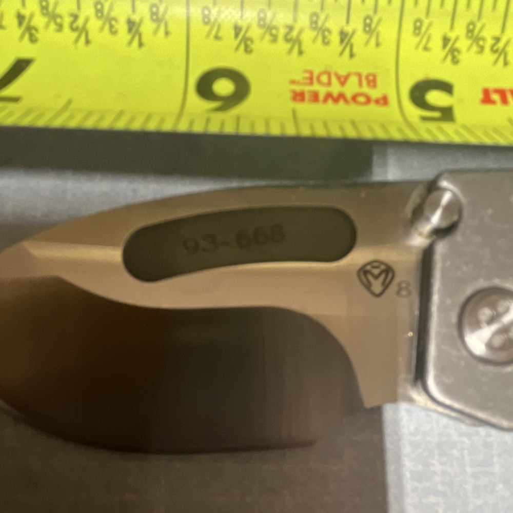 MKT Drop Point Manual Folding Pocketknife Silver Titanium Frame Lock Gray Handle