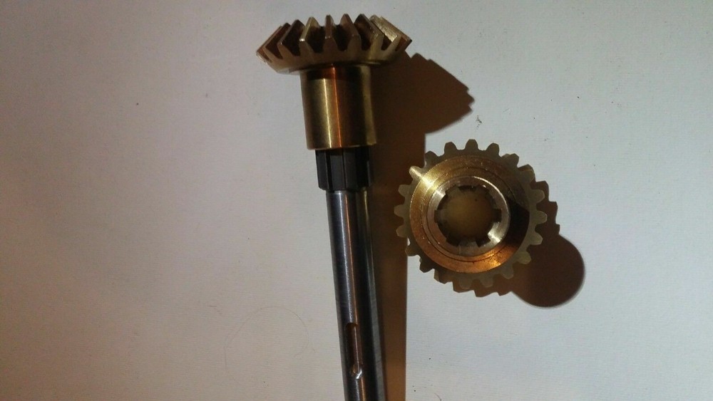 Tapered gears complete with shaft pair