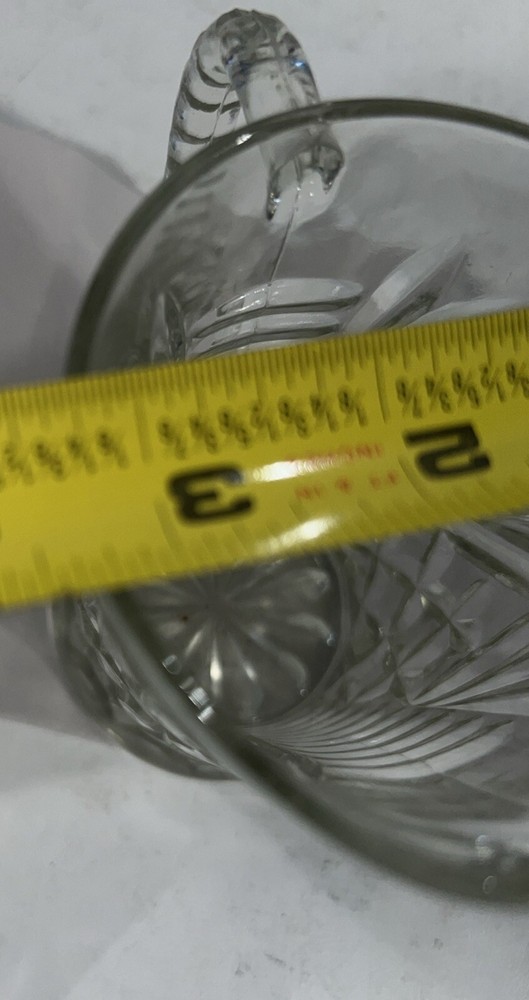 Cut glass pitcher 5 1/4" and 3 1/2" Diameter