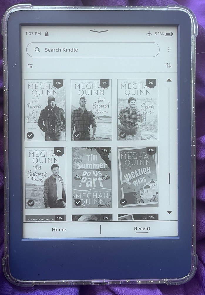Amazon Kindle ereader Blue with books