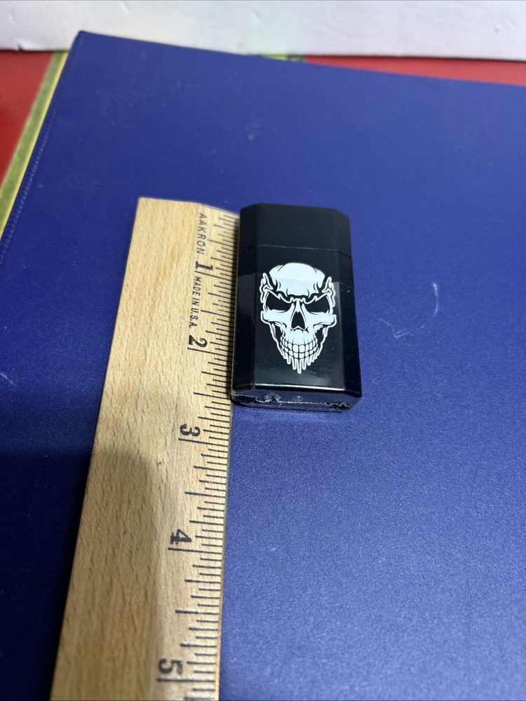 Zippo Ronson JetLite Black Skull Lighter NOS