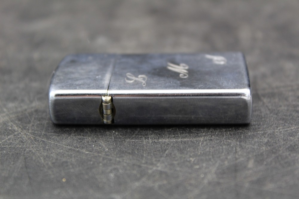 Zippo Lighter 2-1/4” X 1-1/8”.