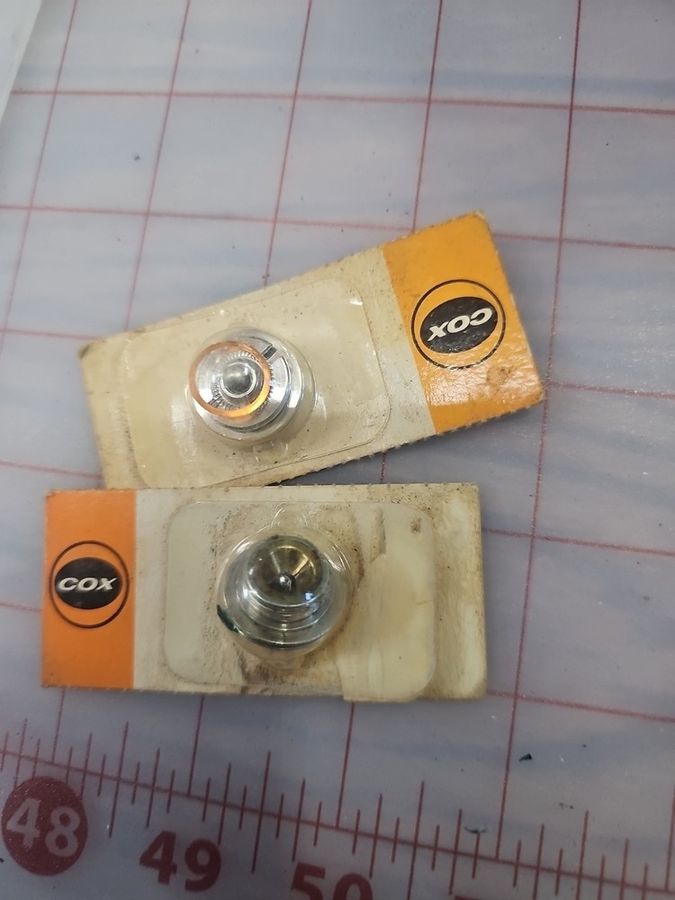 1 New 1 Slightly Used Glow Plug 1702
