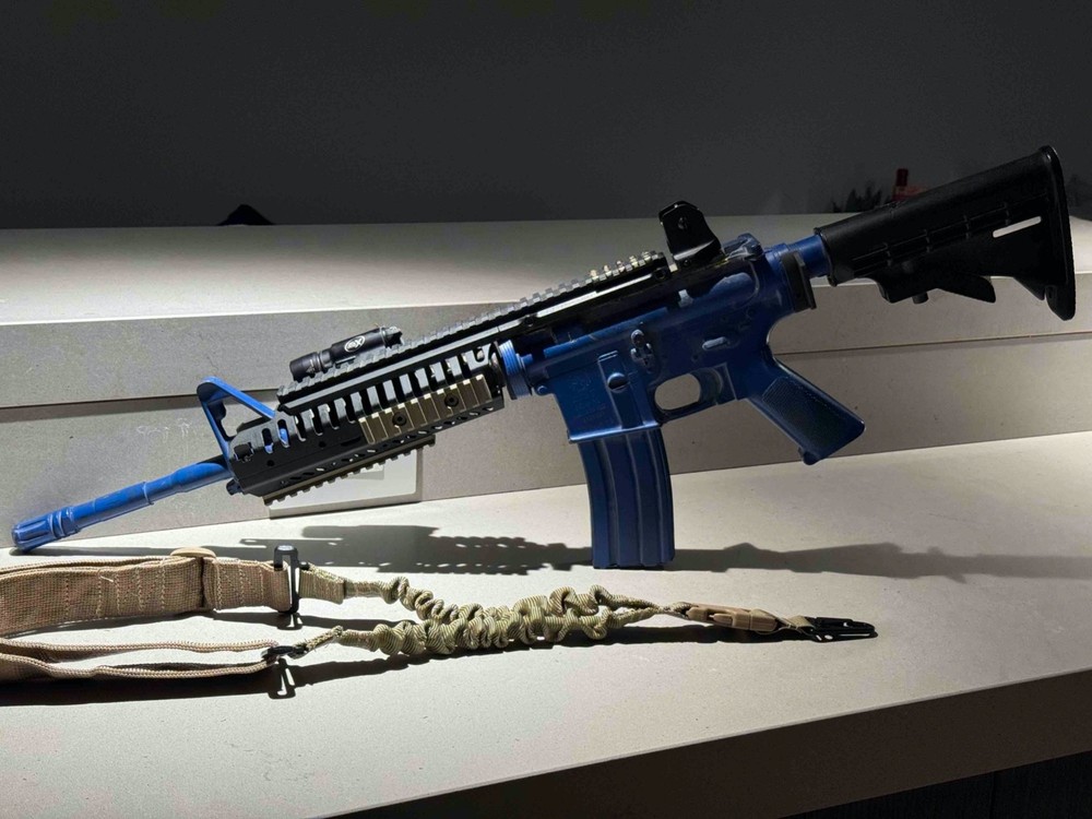 Ring's Blue Gun Training Replica Accessorized: VLTOR/Surefire/DanielDefense/GGG