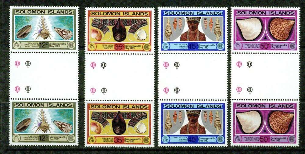 SOLOMON ISLANDS -1983- COMM ‘TH  DAY GUTTER PAIRS-VF**