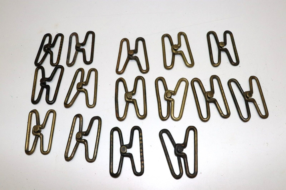 WWII US brass pistol belt hardware rounded peg set each E5205