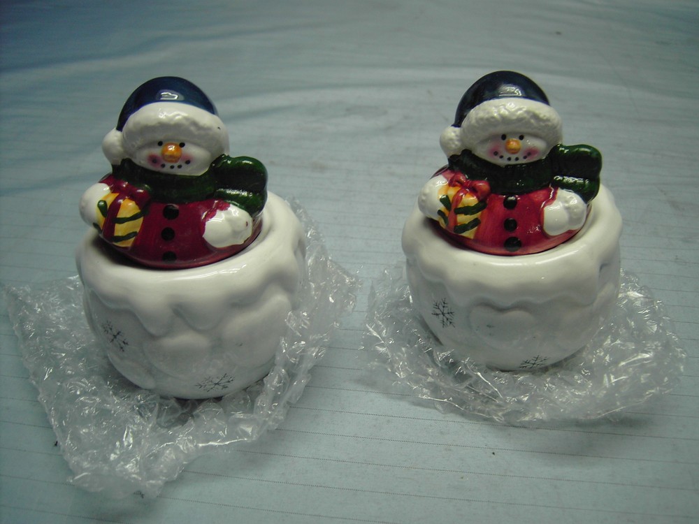 Two Snowman wax filled candle holders